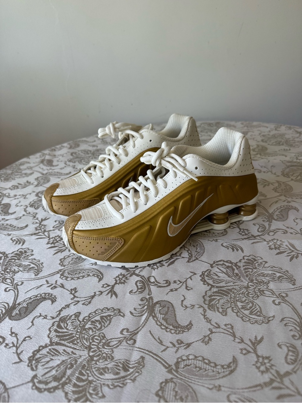 Nike Shox Athletic Sneakers in White and Gold